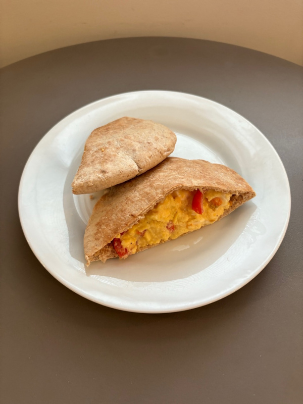 Breakfast eggs in pitta